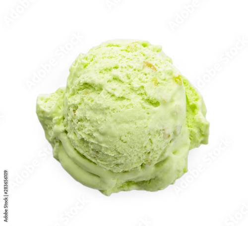 Scoop of delicious pistachio ice cream on white background, top view