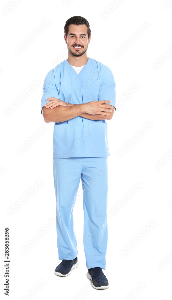 Young male doctor in uniform on white background. Medical service Young male doctor in uniform on white background. Medical service
