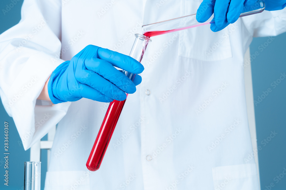 Scientific experiments in a chemistry lab. Color liquids and test tube Scientific experiments in a chemistry lab. Color liquids and test tube