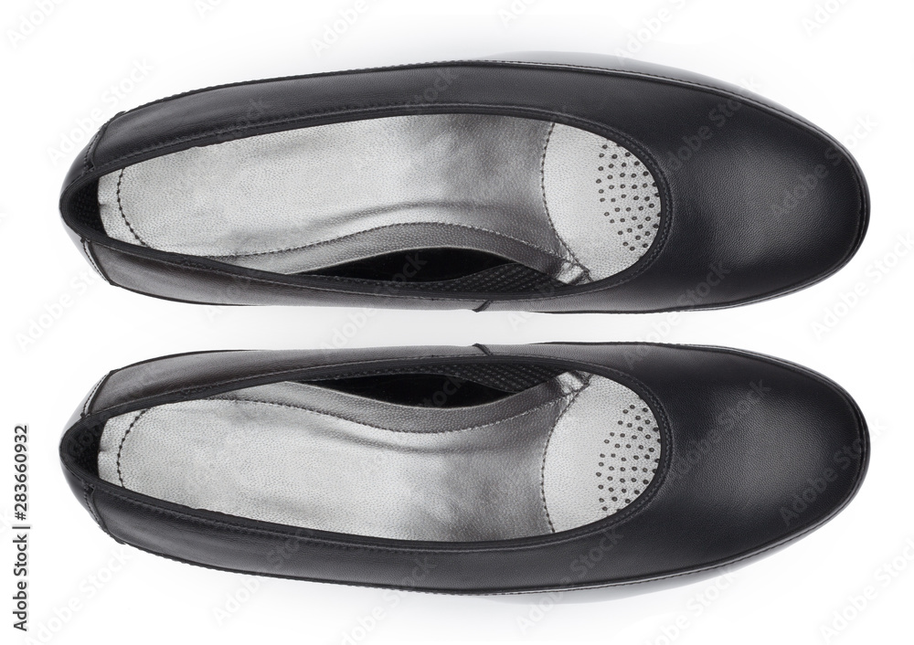 Female shoes on a white background. Top view. Female shoes on a white background. Top view.