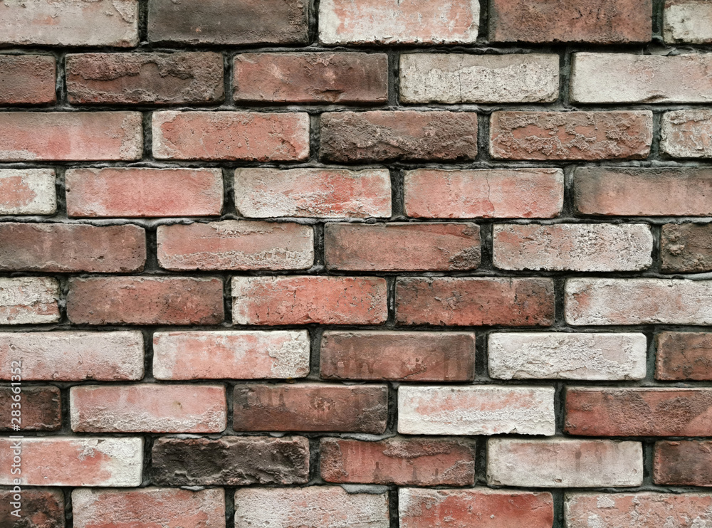 Brick wall background texture and wallpaper. Exterior wall decoration and design. Brick wall background texture and wallpaper. Exterior wall decoration and design.