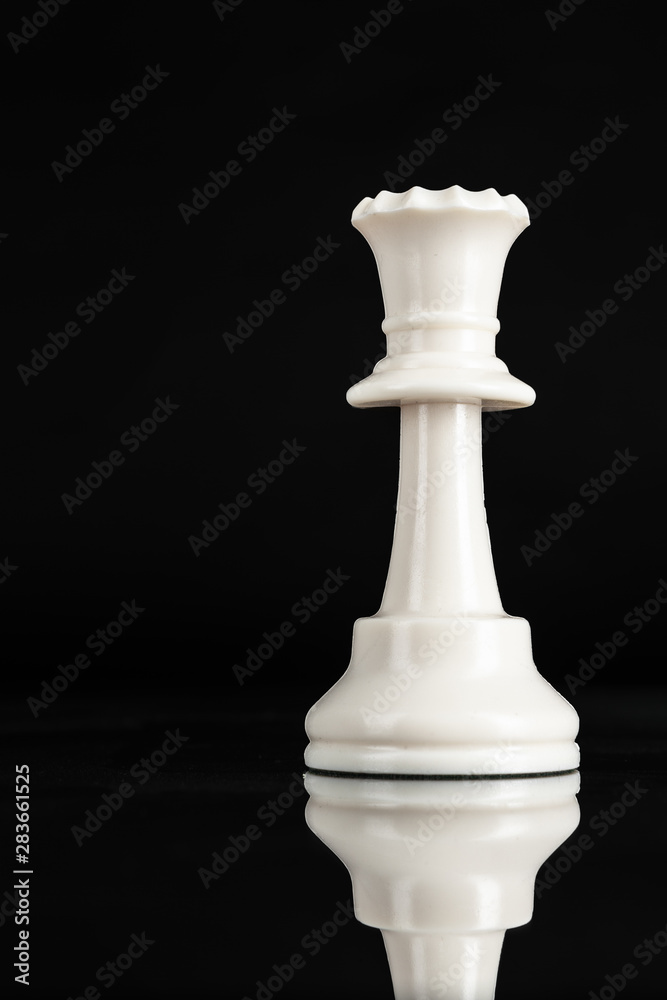 Chess piece close up on black background. Leadership concept Chess piece close up on black background. Leadership concept