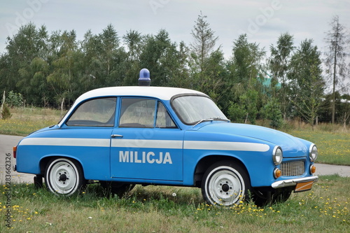 MILICJA old blue police car in Poland.