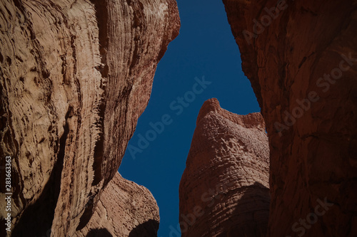 Bottom-up view to Abstract Rock formation at plateau Ennedi aka stone forest in Chad