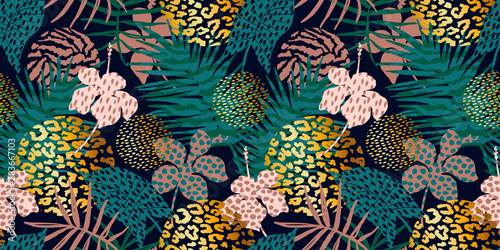 Trendy seamless exotic pattern with palm, animal prints and hand drawn textures.