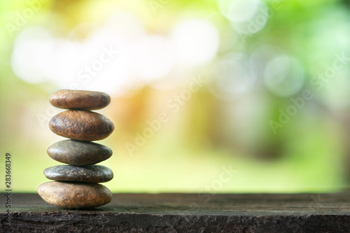 Balance stone with spa on abstract bokeh background