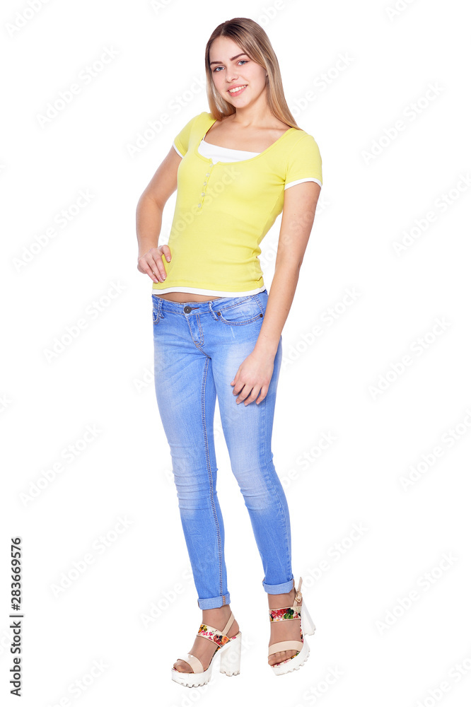 Obraz premium beautiful woman in jeans posing on white