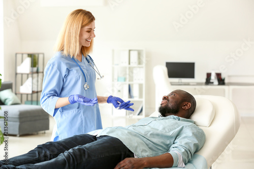 African-American man meetin...