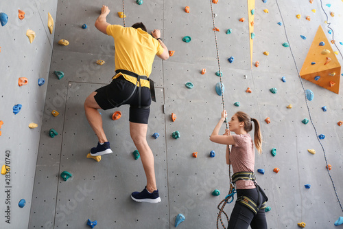 Young man with instructor c...