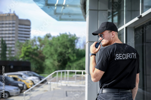 Handsome male security guard outdoors