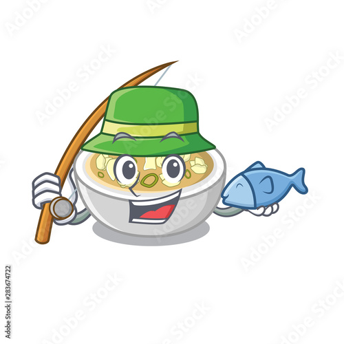 Fishing wonton soup in a cartoon bowl