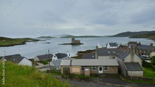 Castlebay Barra looking out to Kisimul castle on a grey day photo