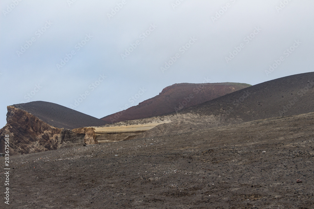 Capelinhos volcano on western coast on Faial island, Azores, Portugal. Last volcano eruption was in 1957.