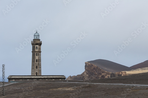 View over Capelinhos volcano, lighthouse of Ponta dos Capelinhos on western coast on Faial island, Azores, Portugal. Last volcano eruption was in 1957. © Marija Krcadinac