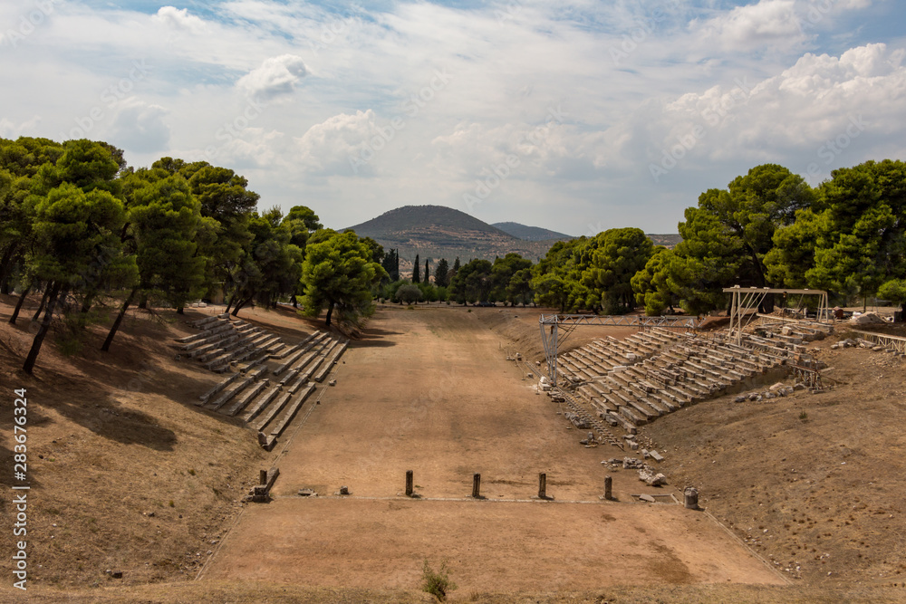 Ruins of stadium and buildings at the Sanctuary of Asklepios at Epidaurus, Peloponnese, Greece