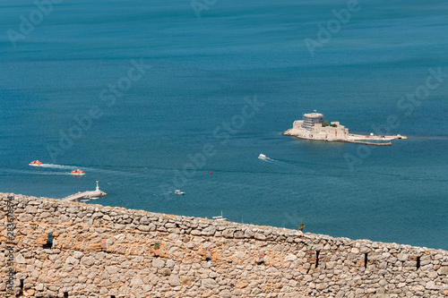 Aerial view over Bourtzi Castle on a small islet in city of Nafplio former capital of Greece, Peloponnese.
