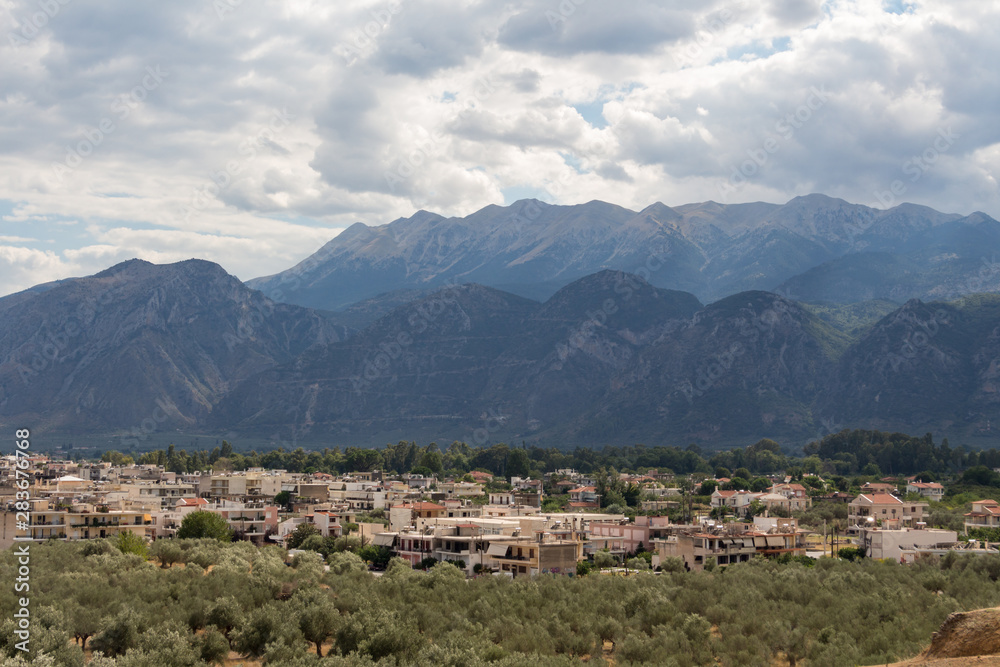 Fototapeta premium Panoramic view of town of Sparta, Peloponnese, Greece with Taygetus mountains in the background.