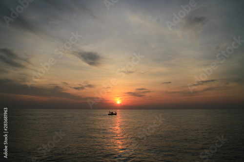 sunset over the sea © pichit