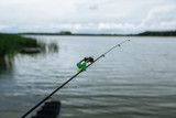 bell on a fishing rod for fishing on a lake