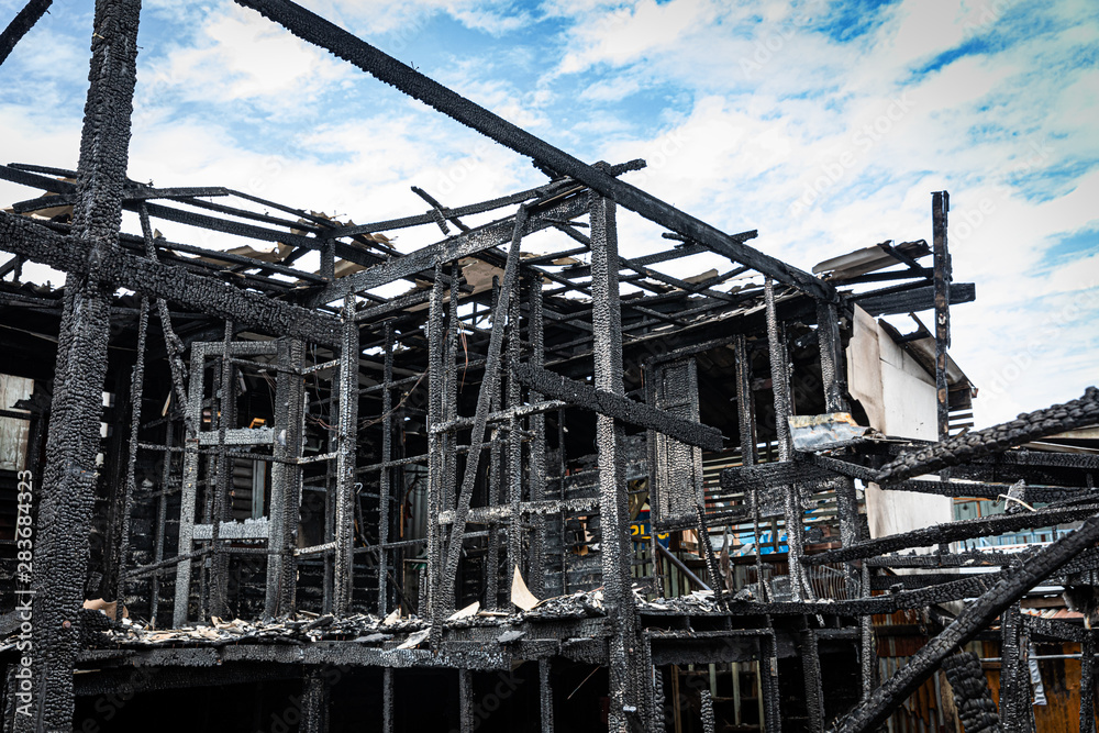 The old wooden house in the slum caused a fire in the ruins. The old wooden house in the slum caused a fire in the ruins.