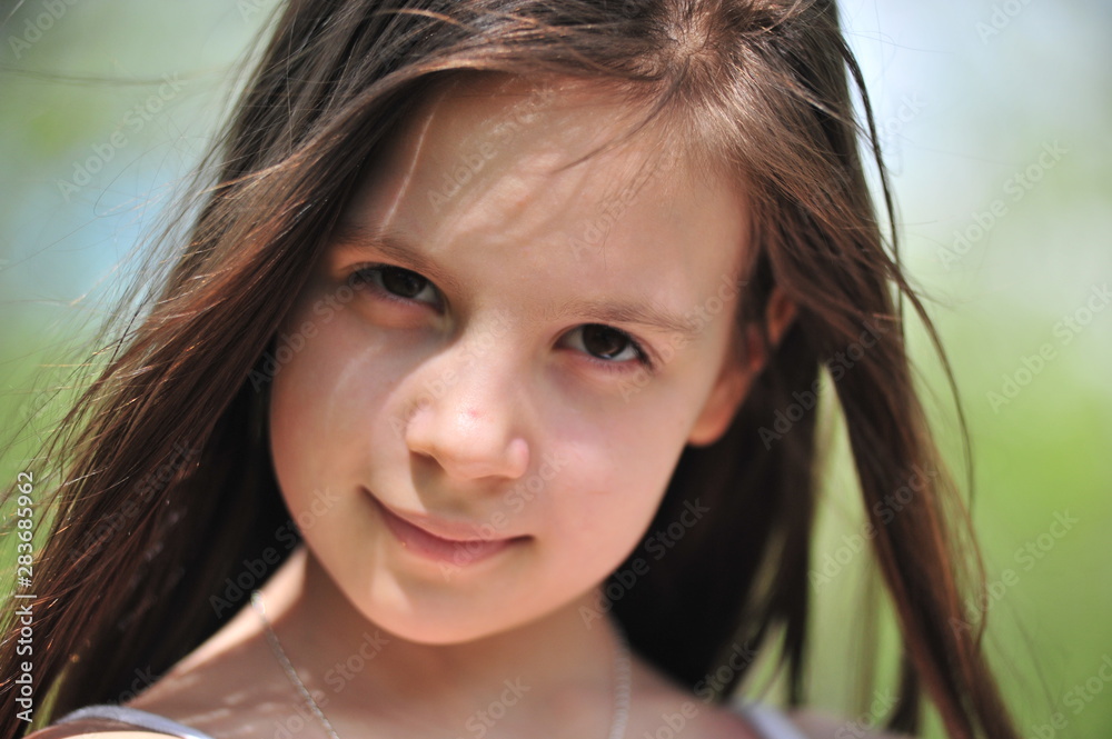 Portrait of the little girl with long hair. Portrait of the little girl with long hair.