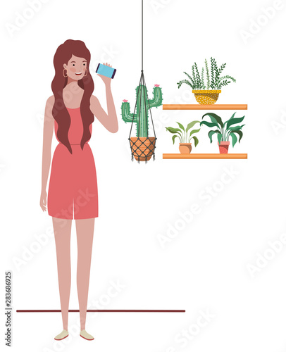 woman with houseplant and macrame hangers