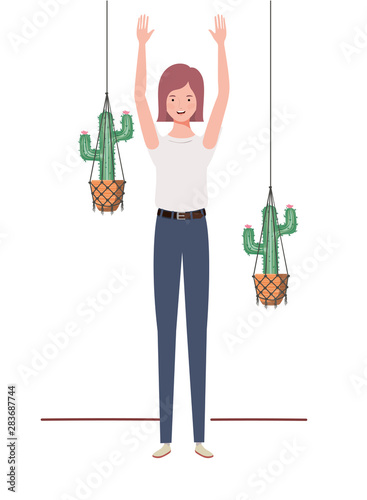 woman with houseplant and macrame hangers