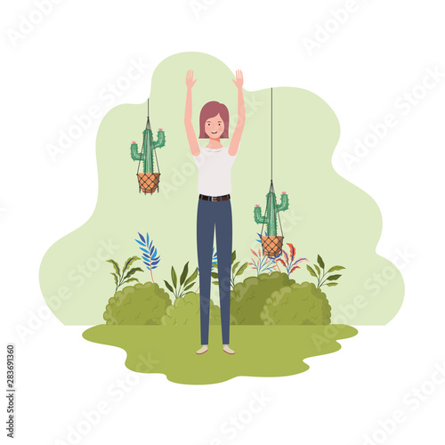 woman with macrame hangers and background landscape