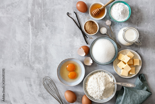 Baking ingredients: flour, eggs, sugar, butter, milk and spices