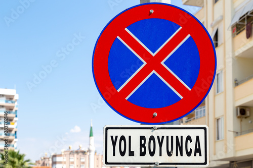Turkish road sign stating PARKING PROHIBITED with copy space.