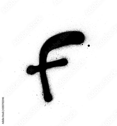 graffiti thin F font sprayed in black over white