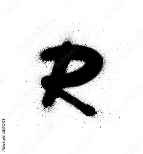 graffiti thin R font sprayed in black over white