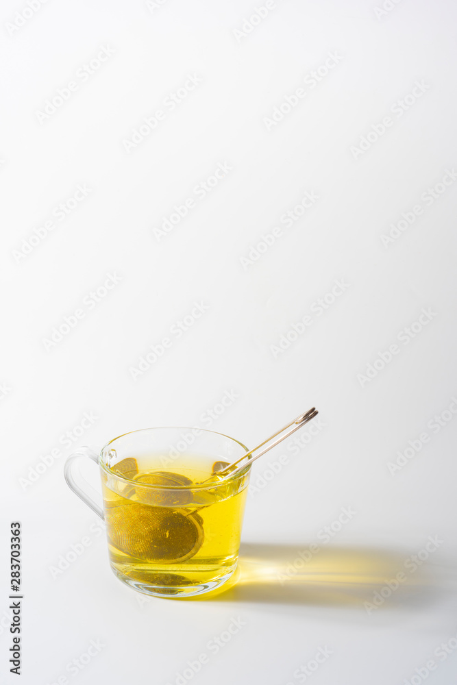 A cup of Chamomile tea in a clear glass mug A cup of Chamomile tea in a clear glass mug