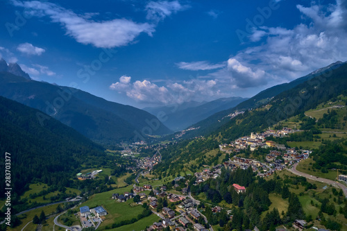 Panoramic view of the Ponte di Legno region of Trento the north of Italy. The popular ski resort town of Ponte di Legno. Summer time of the year. Aerial view. Photo taken on a drone.