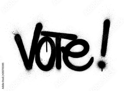 graffiti vote word sprayed in black over white