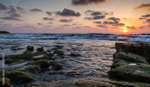 Summer day sunset on the Mediterranean coast in Nahariyya city in Israel