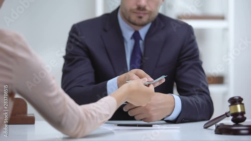 Woman giving bribe to corrupt lawyer, document falsification in illegal business