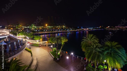 singapore city night illuminated famous sentosa island port bay mall rooftop panorama 4k timelapse photo