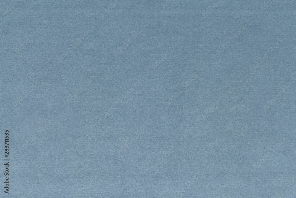 Cardboard texture close-up. Dark old paper background. Grunge concrete wall. Vintage blank wallpaper.