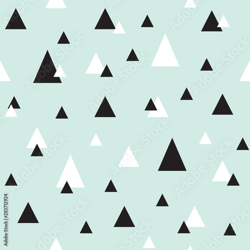 Seamless geometric pattern with a triangle. White and black triangles of different sizes scattered on a neo-mint background. A modern design ready for printing or for a website. Neo mint illustration.