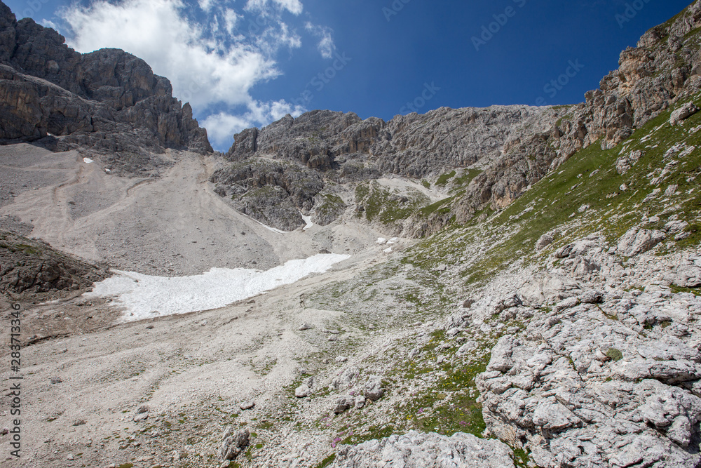 Mugoni's small mountain group Cima Sud South summit and Zigolade pass as seen f in the middle of Catinaccio Rosengarten massif, Dolomites, Sout Tyrol, Italy Mugoni's small mountain group Cima Sud South summit and Zigolade pass as seen f in the middle of Catinaccio Rosengarten massif, Dolomites, Sout Tyrol, Italy
