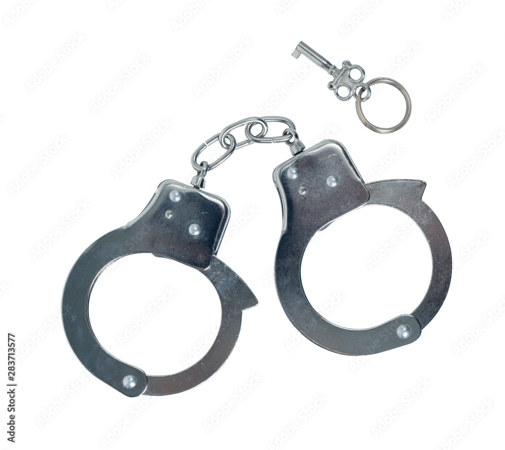 Handcuffs isolated on white Handcuffs isolated on white