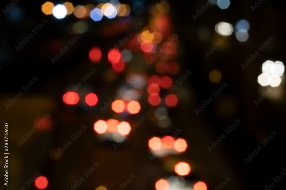 Bokeh, car lights on the night road