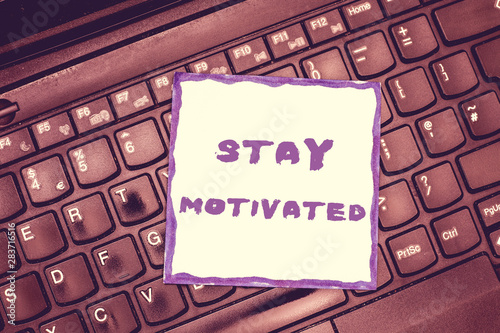 Handwriting text Stay Motivated. Concept meaning Reward yourself every time you reach a goal with knowledge.