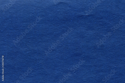 Textured blue paper background