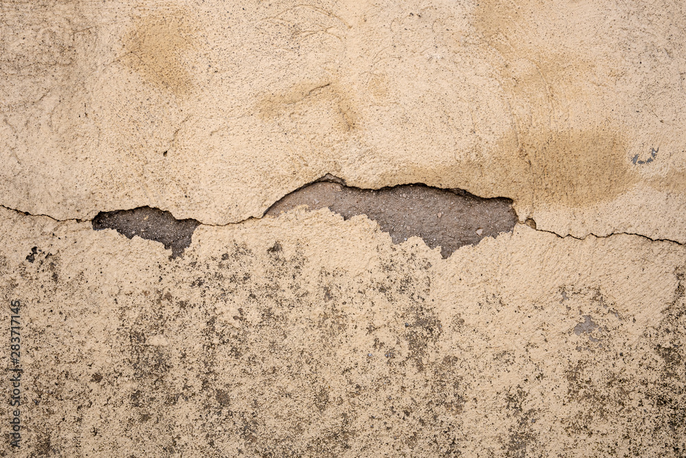 Fissure, crevasse dans un mur en béton, arrière-plan et texture Fissure, crevasse dans un mur en béton, arrière-plan et texture
