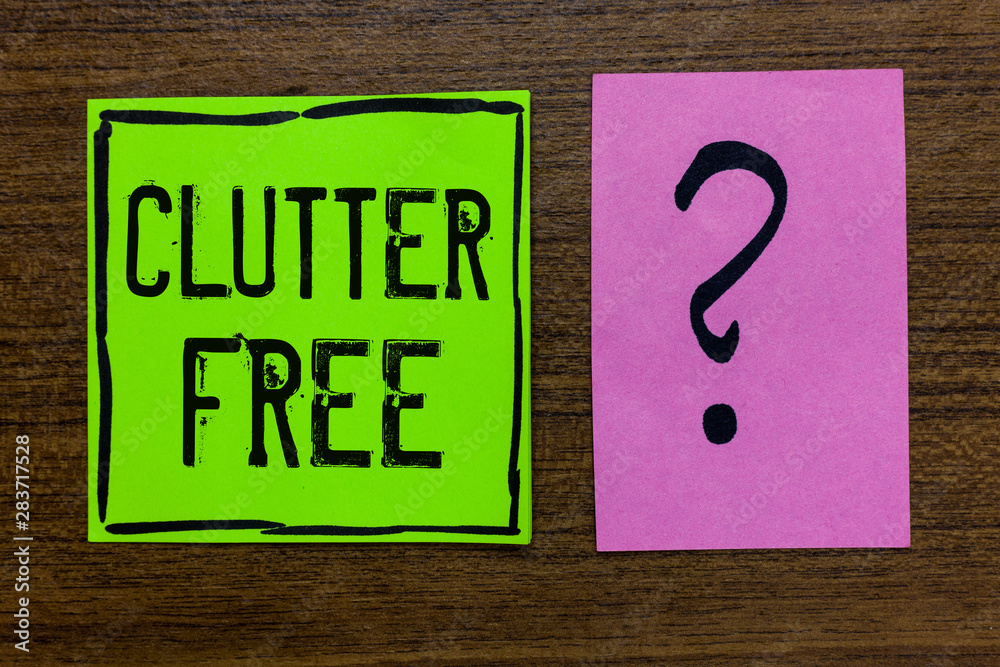 Handwriting text Clutter Free. Concept meaning Well organized and arranged Tidy All things in right places Green paper note Important reminder pink question mark wooden background Handwriting text Clutter Free. Concept meaning Well organized and arranged Tidy All things in right places Green paper note Important reminder pink question mark wooden background