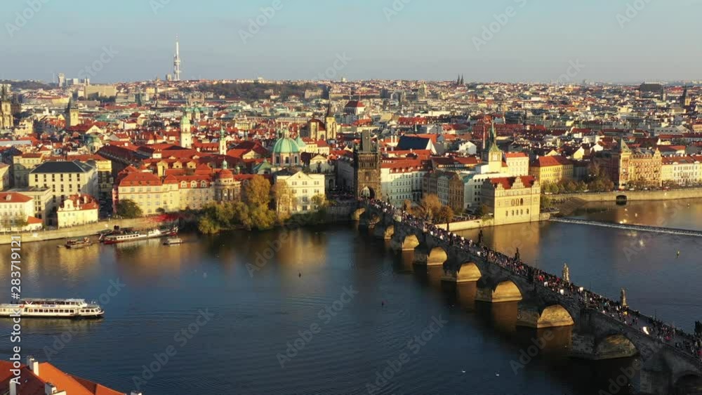 Scenic autumn aerial view of the Prague Old Town pier architecture and Charles Bridge over Vltava river in Prague, Czech Republic Scenic autumn aerial view of the Prague Old Town pier architecture and Charles Bridge over Vltava river in Prague, Czech Republic