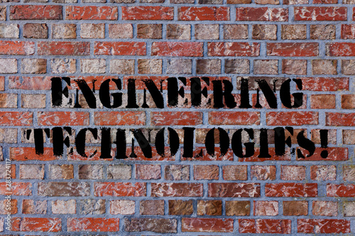 Text sign showing Engineering Technologies. Business photo text application of scientific and engineering knowledge Brick Wall art like Graffiti motivational call written on the wall