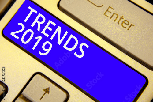 Word writing text Trends 2019. Business concept for Upcoming year prevailing tendency Widely Discussed Online Keyboard blue key Intention create computer computing reflection document